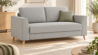 Grijze Bruno Bed slaapbank in een lichte woonkamer